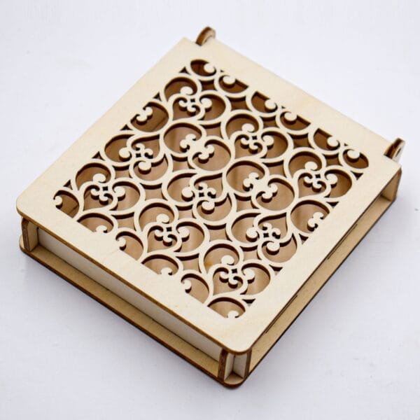 Custom Carved Wooden Box: Laser-cut decorative box with intricate scrollwork design.