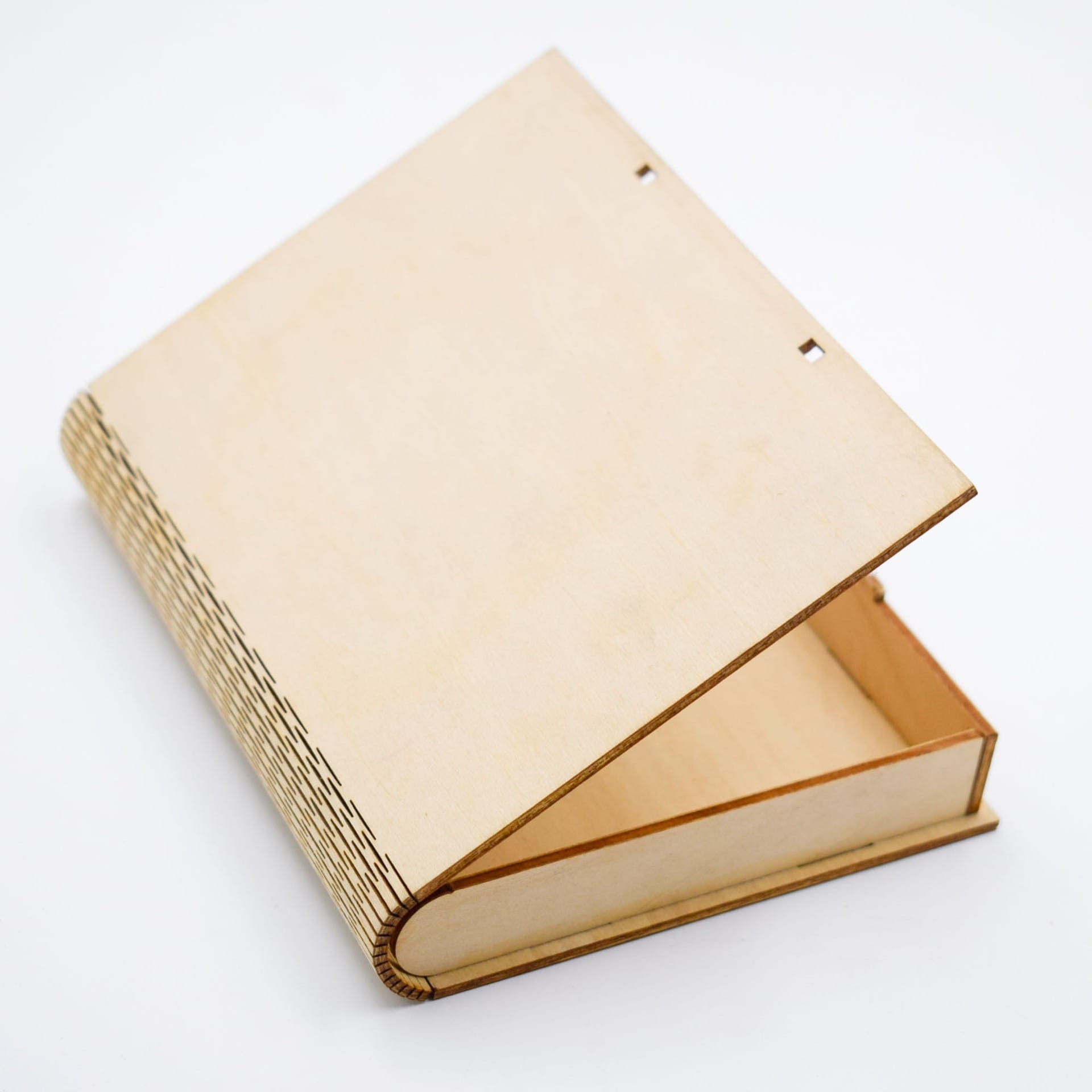 Custom Carved Wooden Box: Laser-cut, unfinished wood box shaped like a book, open to reveal storage.