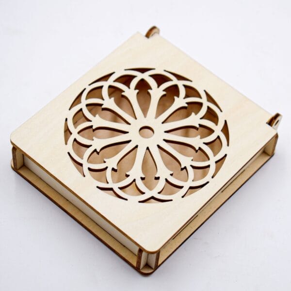 Custom Carved Wooden Box: Laser-cut decorative box with intricate floral design.