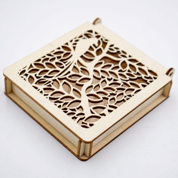 Custom Carved Wooden Box: Square laser-cut wooden box featuring a bird and tree design. A beautiful carved wooden box.