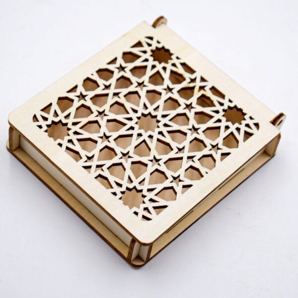Custom Carved Wooden Box: Laser-cut square carved wooden box with geometric star pattern.