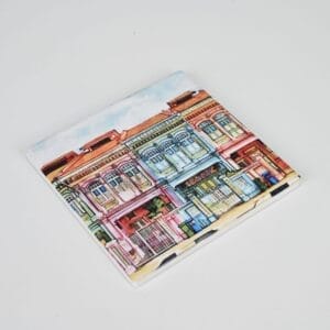 AUTO-DRAFT: Square tile featuring a watercolor painting of vibrant, colorful buildings.