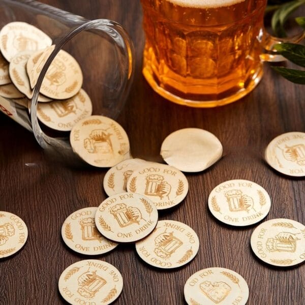 Custom Wooden Drink Tokens: Boxwood party tokens for weddings, bars, and promotions spilling from a glass with a beer mug.