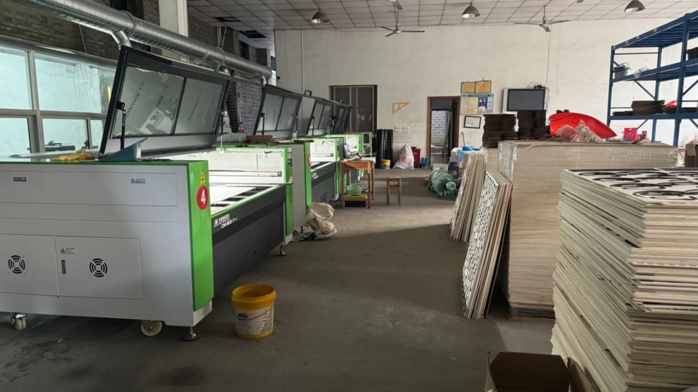 Laser cutting machines in a small business manufacturing workshop.