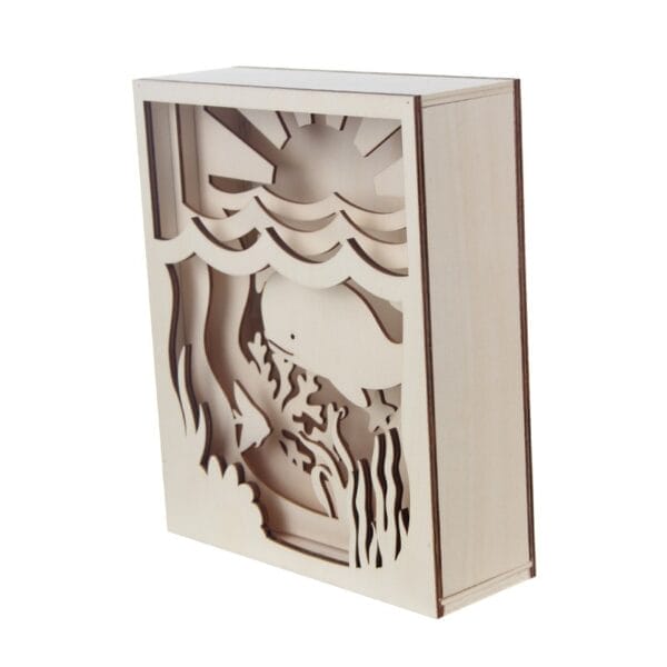 Laser Cut Wood Shadow Box: wooden shadow box with ocean scene: whale, fish, sun.