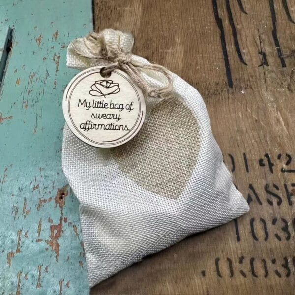 Burlap sack with heart, tag reads "My little bag of sweary affirmations