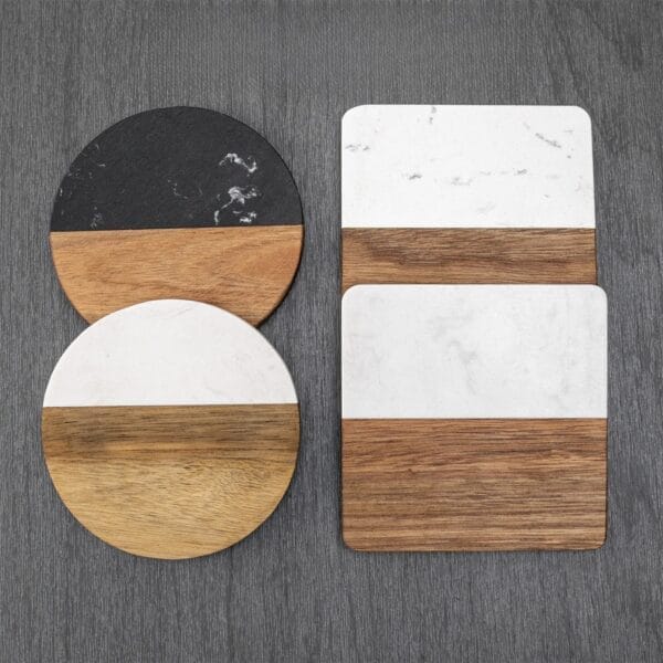 AUTO-DRAFT coasters: Round and square wood & marble-effect coasters for drinks on a gray wood surface.