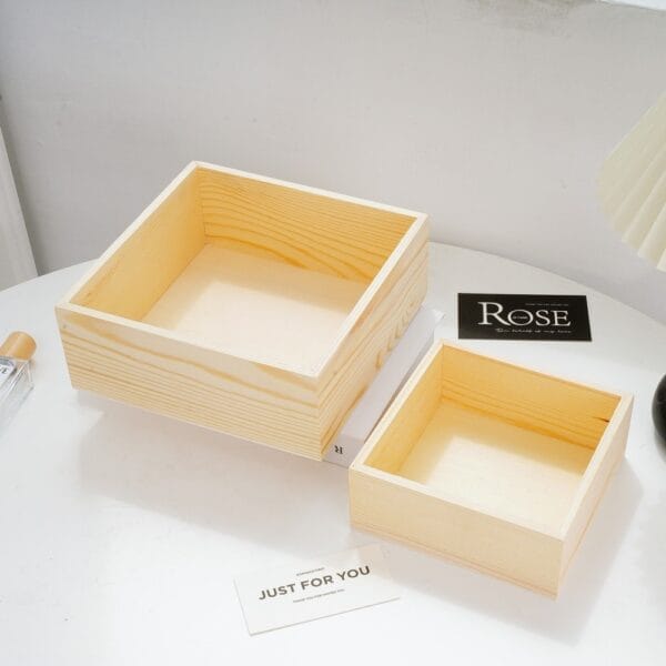 Mini Wooden Boxes Wholesale: Two unfinished wooden boxes, different sizes, ready for crafting or storage.