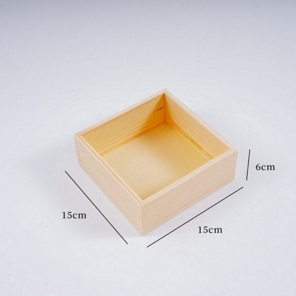 Wooden box, 15cm x 15cm x 6cm. Simple, unfinished wood storage.