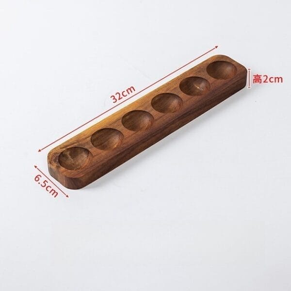 Wooden egg holder with six slots, 32cm long, 6.5cm wide, and 2cm high