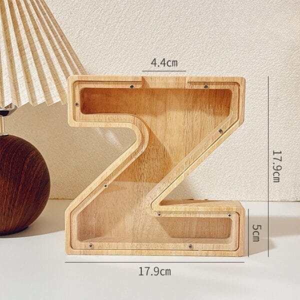 AUTO-DRAFT: Wooden letter Z shaped coin bank with dimensions 17.9cm x 17.9cm x 4.4cm x 5cm