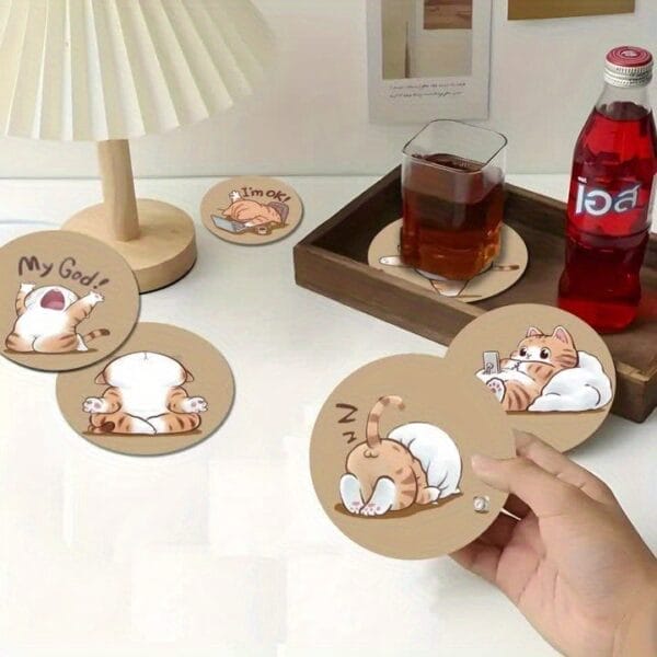 Cute cat coasters: Round drink coasters with funny cartoon cat designs.