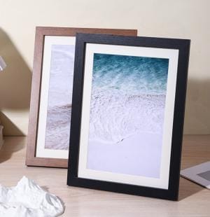 Personalized Wood Picture Frames: Dark and light brown frames displaying beach scenes; OEM wholesale available.