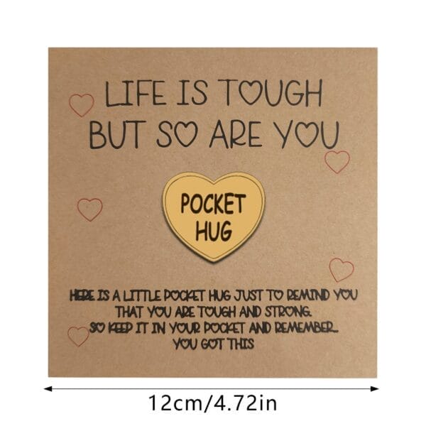 Pocket Hug token with encouragement: "Life is tough but so are you." A reminder of strength.