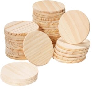 Unfinished round wooden discs in stacked piles, craft supplies