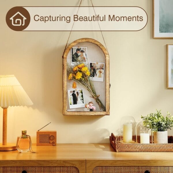 Unfinished Wood Shadow Boxes Wholesale: Wooden framed photo display with photos & flowers, hanging above a desk. Capturing beautiful moments.