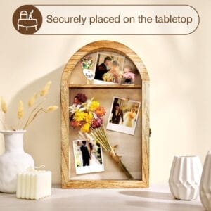 Arched wooden photo display shelf with wedding photos, dried flowers, and decorative objects.