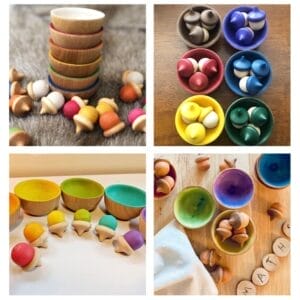 Wooden bowls and acorn toys in rainbow colors for sorting and pretend play.