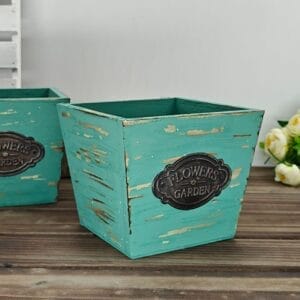 AUTO-DRAFT: Distressed turquoise wooden square planters with "Flowers Garden" labels, set of two