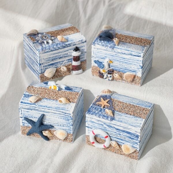 Nautical themed decorative boxes. Handcrafted wooden boxes with beachy accents like starfish, lighthouse, and seashells.