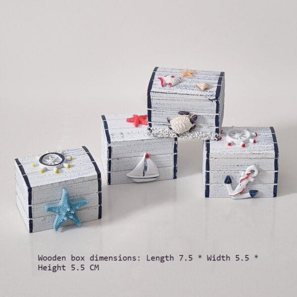 Nautical themed wooden boxes with starfish, anchor, sailboat, and compass decorations