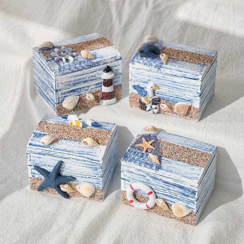 Nautical themed decorative boxes. Handcrafted wooden boxes with beachy accents like starfish, lighthouse, and seashells.