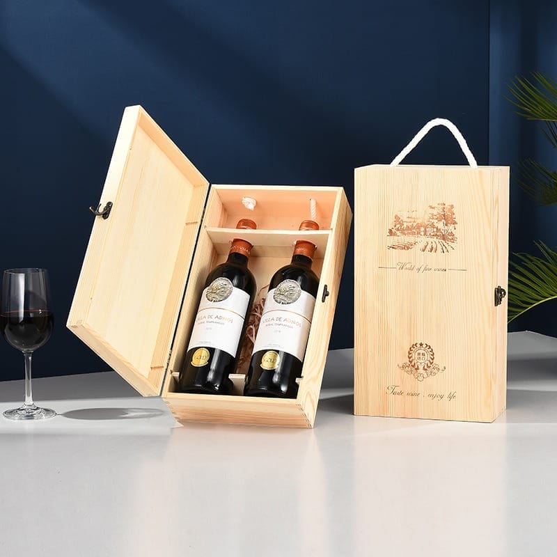 Two bottles of wine in a wooden gift box, with a wine glass and another closed box. "Taste wine, enjoy life" text.