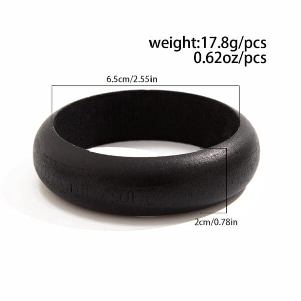 Black wooden bangle with 6.5cm diameter and 2cm width.