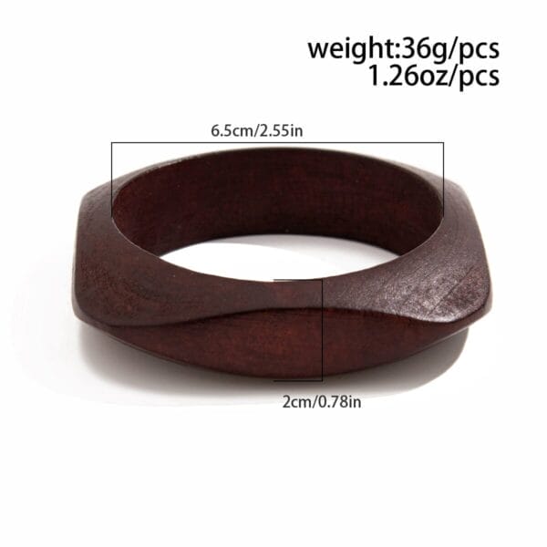 Brown wooden bangle, 6.5cm wide, 2cm thick, and weighing 36g, showcasing its dimensions.