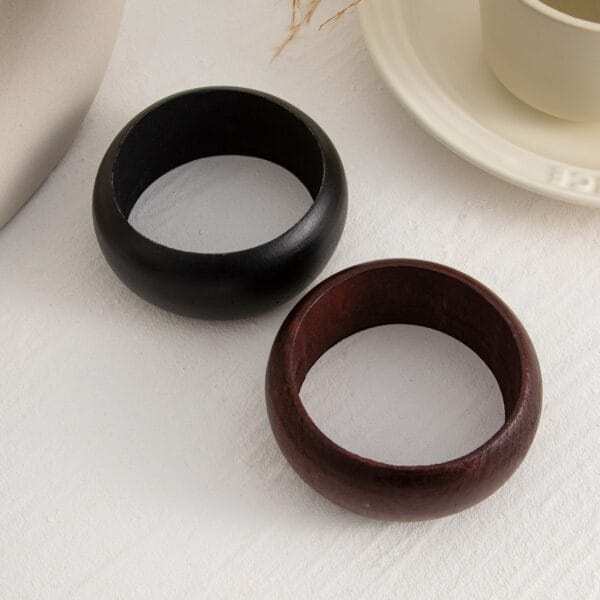 Vintage Geometric Wooden Bangles Set: Black and brown wooden bracelets.