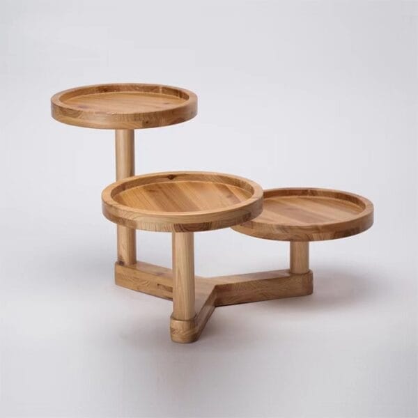 AUTO-DRAFT: Wooden tiered display stand with three round platforms for showcasing items