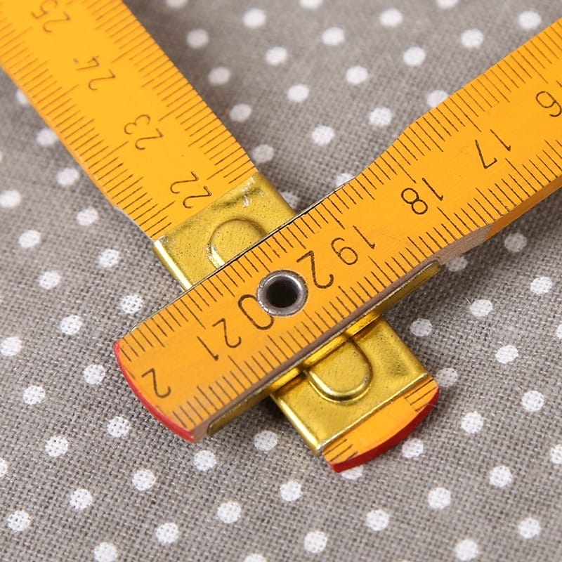 Orange 1.5m Wooden Folding Ruler: 5-section metric ruler by Wooden Folding Ruler Manufacturers.