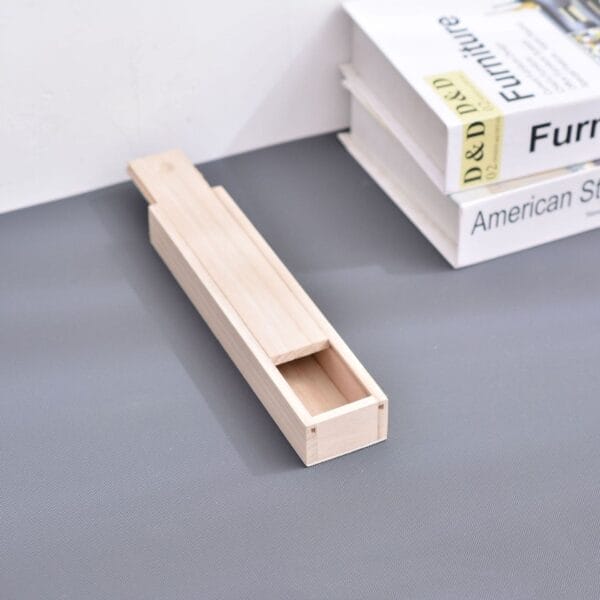 AUTO-DRAFT: Unfinished wooden box with sliding lid, partially open, showcasing its interior