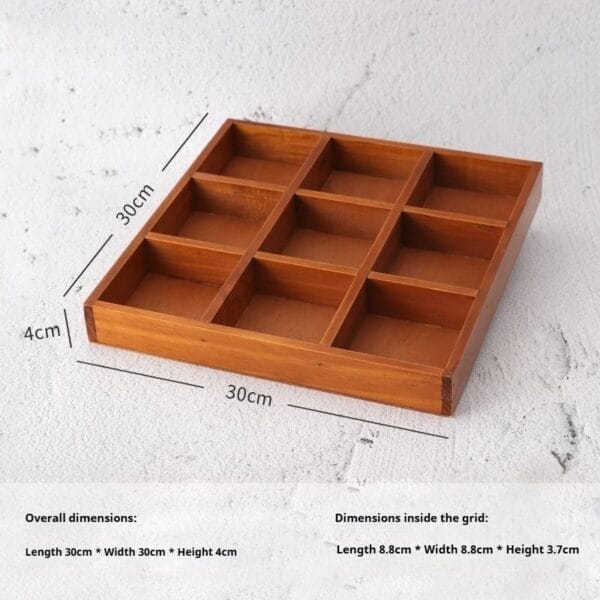 Wooden tray with 9 equally sized compartments, ideal for organizing small items or displaying collections.