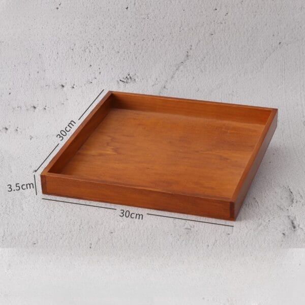 Square wooden serving tray, 30x30cm, with 3.5cm high sides.