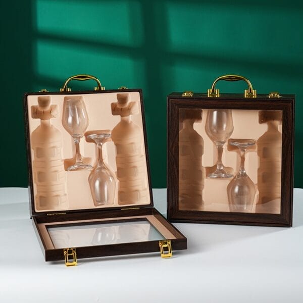 AUTO-DRAFT: Two wooden wine cases, one open revealing bottle & glass cutouts.